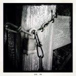 An old rusty lock on a gate to nowhere